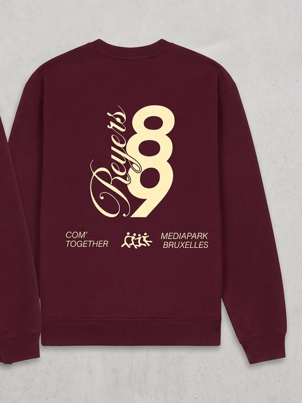 Dos du pull Reyers89 : grand 89, script Reyers, Com' Together et Mediapark Bruxelles